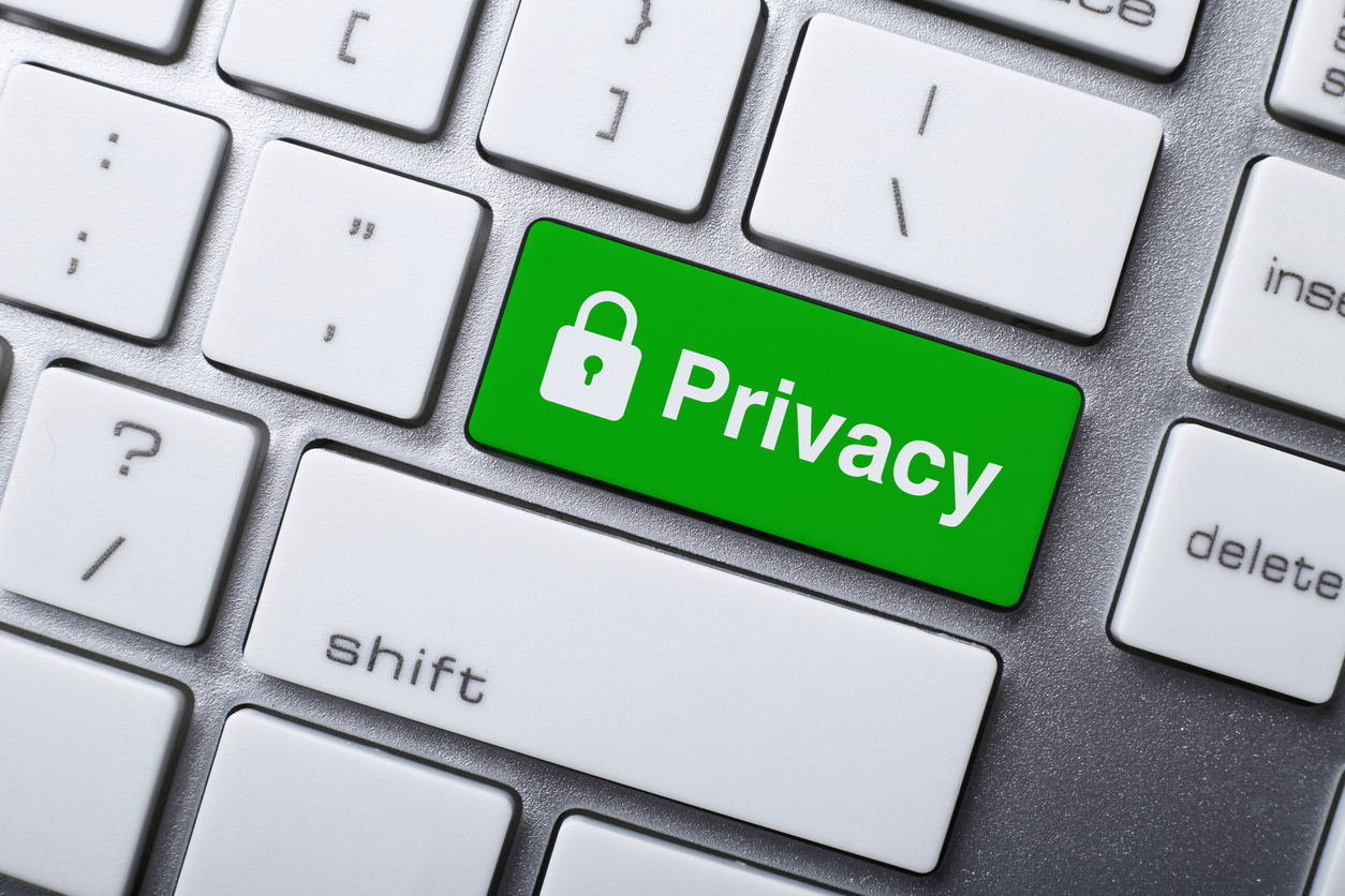 A keyboard with a dedicated green Privacy key